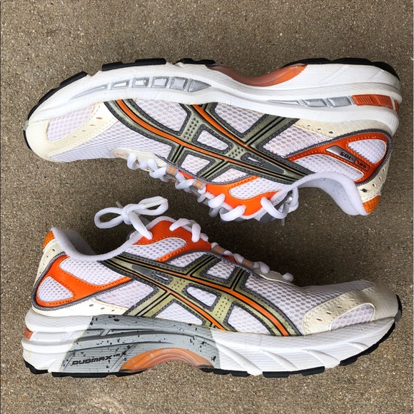 orange and white asics